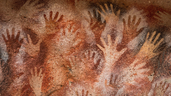Prehistoric hand paintings at the Cave of Hands (Spanish: Cueva de Las Manos) in Santa Cruz Province, Patagonia Argentina, South America. The art in the cave dates from 13,000 to 9,000 years ago.