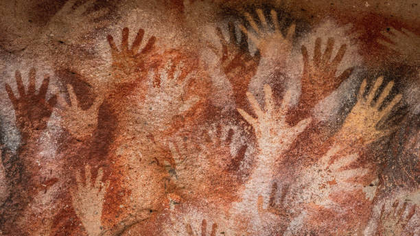 Ancient Cave Paintings at the Cave of Hands aka Cueva de Las Manos in Santa Cruz Province, Patagonia Argentina Prehistoric hand paintings at the Cave of Hands (Spanish: Cueva de Las Manos) in Santa Cruz Province, Patagonia Argentina, South America. The art in the cave dates from 13,000 to 9,000 years ago. cave painting photos stock pictures, royalty-free photos & images
