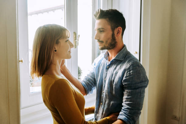 istock Young couple at home 1209961628