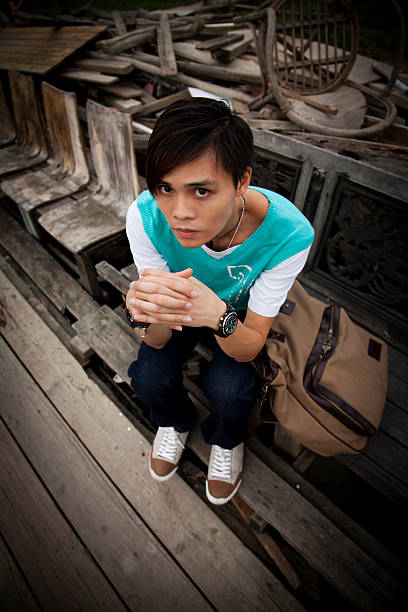 Chinese Teenager in Slum Area stock photo