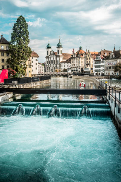 Cityscape Of Lucerne And Jesuit Church In Switzerland Cityscape Of Lucerne And Jesuit Church In Switzerland lucerne switzerland stock pictures, royalty-free photos & images