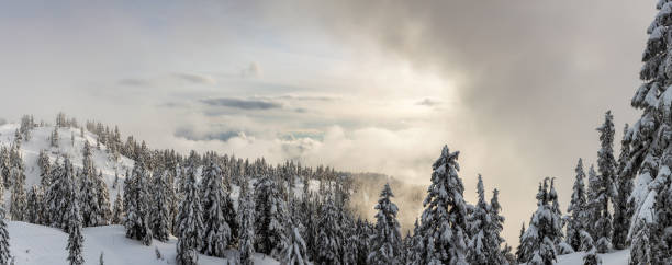 Snow capped mountain ridges view from Mount Washington in the Cascade range. North Bend, Washington.