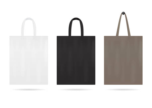 płótno tote bag makiety na sprzedaż. torby na zakupy workowe w kolorze białym, czarnym. pusta torba na tkaninę z uchwytami. torebka do podróży. szablon ecobag wielokrotnego użytku na zakupy. wektor projektu - burlap textile textured sack stock illustrations