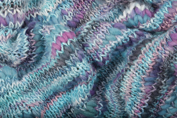 istock Blue and Pink knitted background texture. Handmade hobby crafts concept. 1209966694