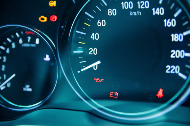 istock Charging warning light and low oil pressure light on dashboard 1209966861