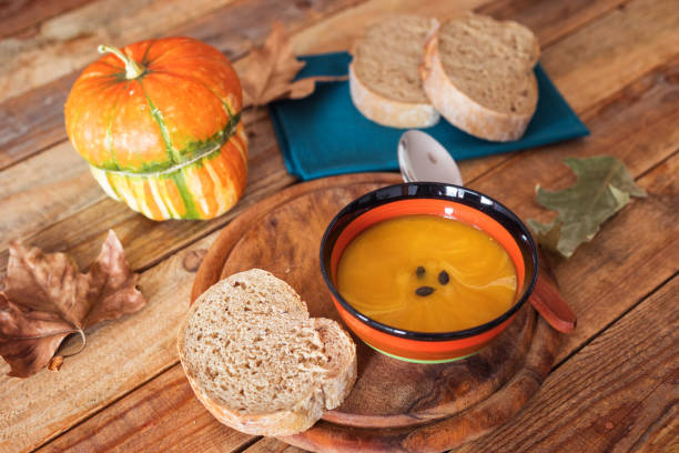 Fresh made pumpkin soup at table, close-up, no people