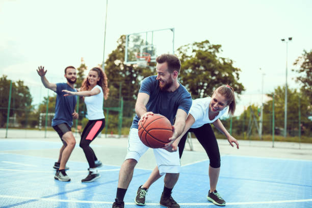 istock Basketball Fun By Couples On Court 1209972505