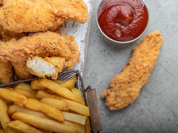 istock chicken strips crispy fried breaded  breast  and sauce 1209972557