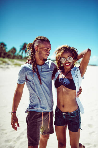 istock Beach Fun For Beautiful Couple 1209972792