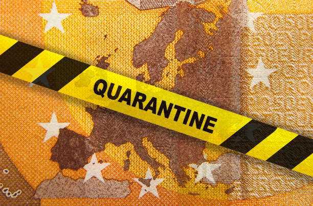 Coronavirus quarantine in Europe. Concept. 50 Euro banknote with EU map and yellow tape. stock photo