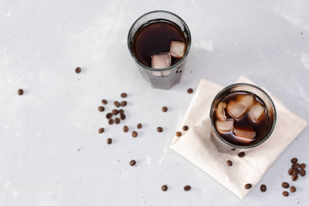 istock Glass Of Cold Coffee On Wood 1209986090