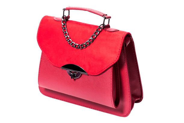 istock women's handbag in red leather and suede, side view 3/4 object on a white background. 1209988272