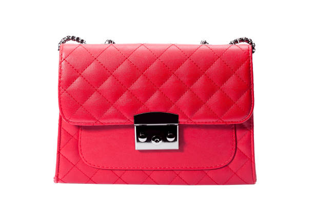 istock femle handbag in red leather with square pattern, front view isolated object back view on a white background. 1209988279
