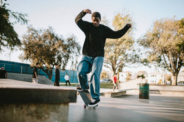 istock Young Man Skateboarding in Los Angeles 1209988479