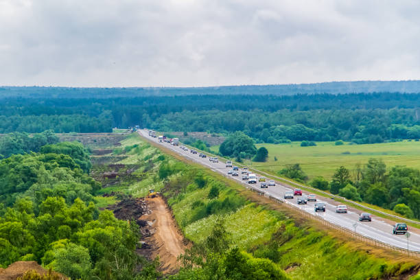 istock The road that goes into the distance, a view from above. 1209989639