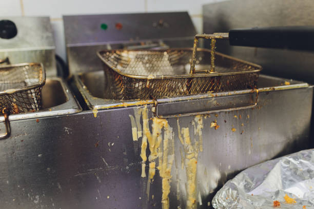 istock Deep fryer with oil on restaurant kitchen. 1209996676