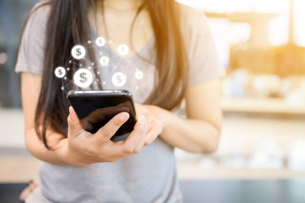 istock Close up image hand using mobile phone with online transaction application, Concept financial technology (fin-tech) and ICO Initial coin offering business financial internet innovation technology 1209998373