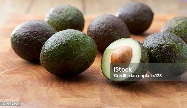 Avocados Stock Photo - Download Image Now - Avocado, Brown, Chopping Food