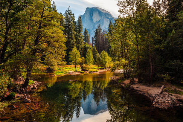 Sunrise Reflections on Half Dome, Yosemite National Park, California stock photo