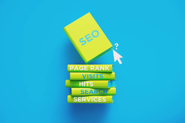 boeken van seo en ranking over blue background - zoekmachine stockfoto's en -beelden