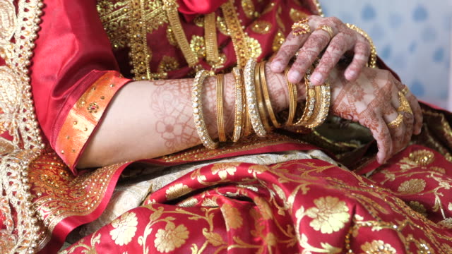 top view of indian bride hand with jewelry