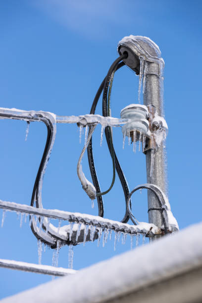 istock Electricity cables covered in ice after frozen rain phenomenon 1210004803