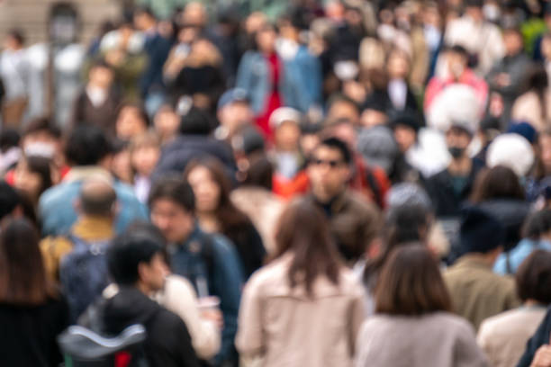 istock Crowded street in Japan, blurred background 1210005933