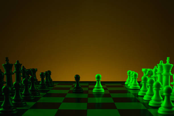 istock Close-up hand makes a pawn move, chess, chessboard, game, confrontation. 1210011841