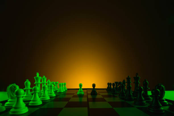 istock Close-up hand makes a pawn move, chess, chessboard, game, confrontation. 1210011855