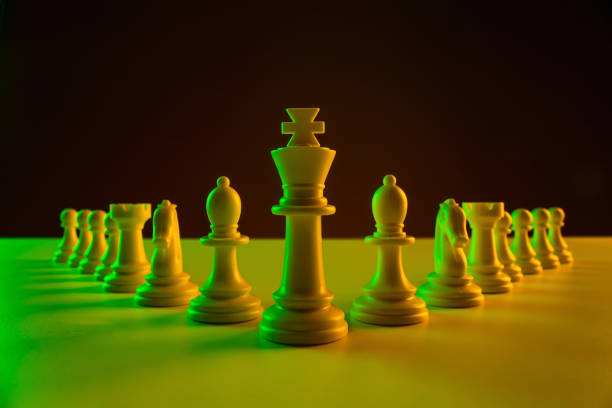 istock Chess pieces on a chessboard, construction, game. The concept of confrontation, career, competition, startup, battle of brains. 1210012034