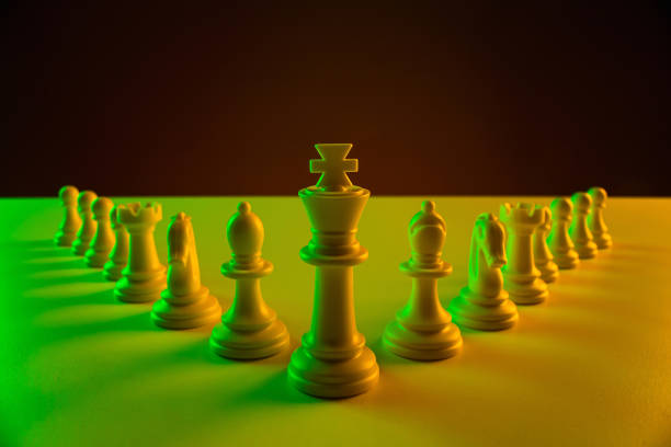 istock Chess pieces on a chessboard, construction, game. The concept of confrontation, career, competition, startup, battle of brains. 1210012146
