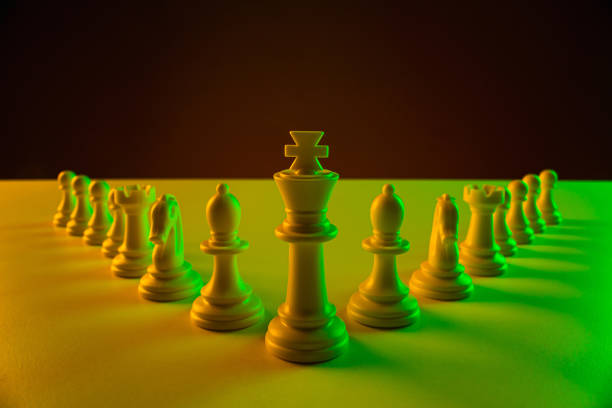 istock Chess pieces on a chessboard, construction, game. The concept of confrontation, career, competition, startup, battle of brains. 1210012150