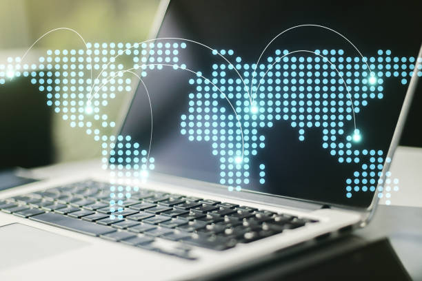 istock Abstract creative world map with connections on modern laptop background, international trading concept. Multiexposure 1210021847