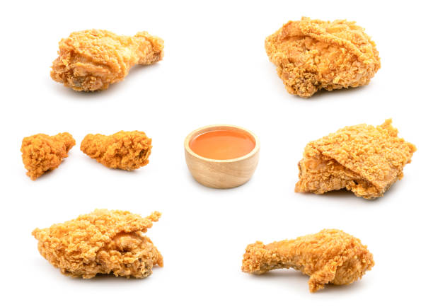 istock Set of fried chicken, burger and chilli sauce isolated on white 1210022232