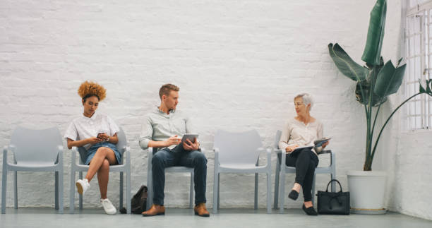 istock Making new work connections in a waiting room 1210026717