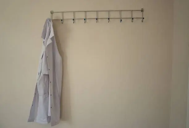 Lab Coat hanged on the wall