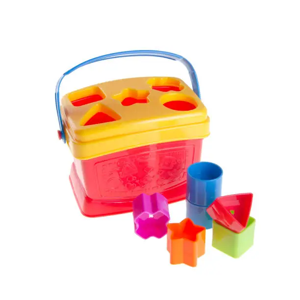 Photo of Toy or baby toy plastic shape sorter on background