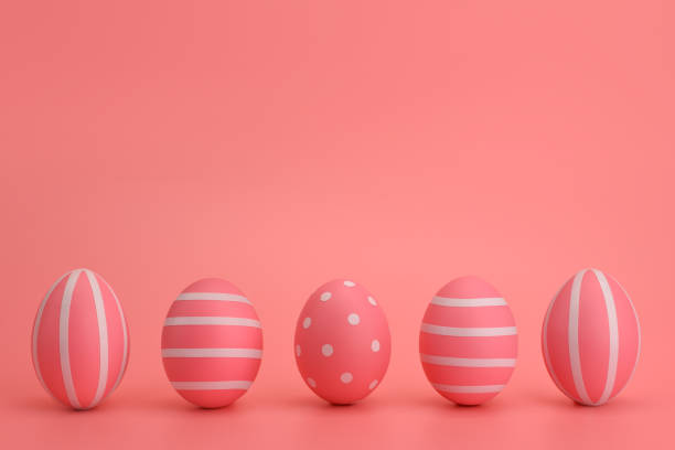 istock Five striped Easter pink eggs in a row on a pink background. 1210030328