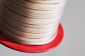 Cable reel with speaker wire close up photo