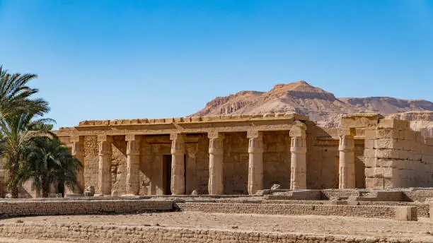 The Mortuary Temple of Seti I is the memorial temple (or mortuary temple) of the New Kingdom Pharaoh Seti I. It is located in the Theban Necropolis in Upper Egypt, across the River Nile from the modern city of Luxor (Thebes). The edifice is situated near the town of Qurna.