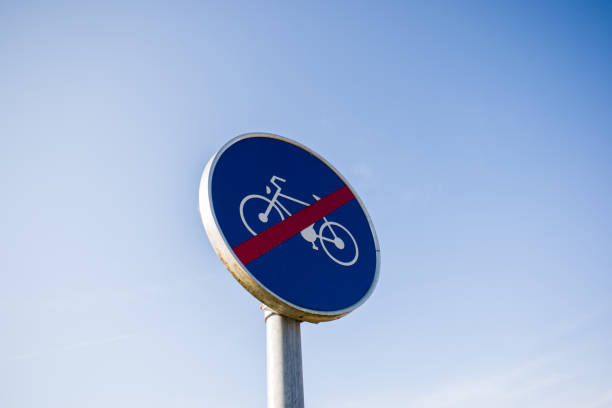 istock End of bicycle lane, path blue round road sign on pole 1210037427