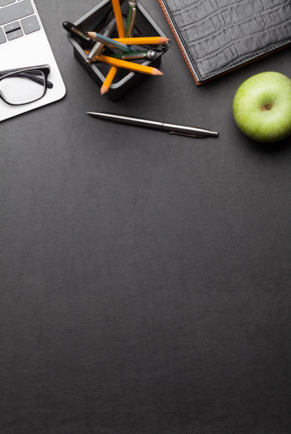 istock Office desk table with laptop and supplies 1210037525