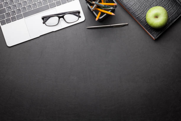 istock Office desk table with laptop and supplies 1210037553