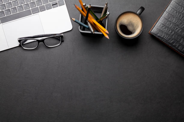 istock Office desk table with laptop and supplies 1210037588