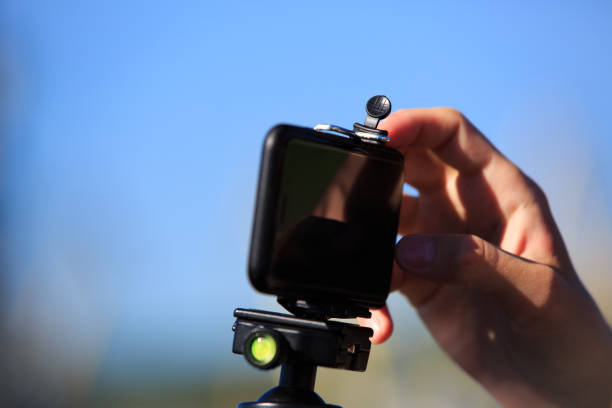 istock Close-up of mobile phone on tripod 1210041725