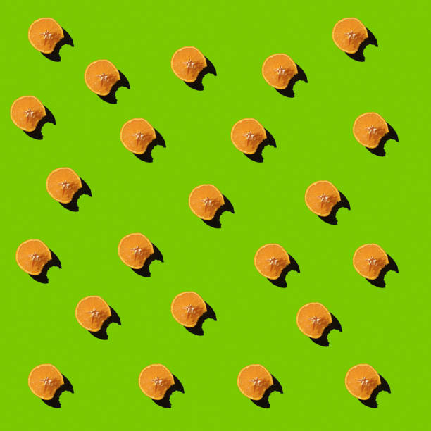 istock Orange Fruits Sparse On Green Tone Background, Aerial View 1210041794