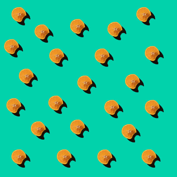 istock Orange Fruits  Sparse On Colored Background, Aerial View 1210041795