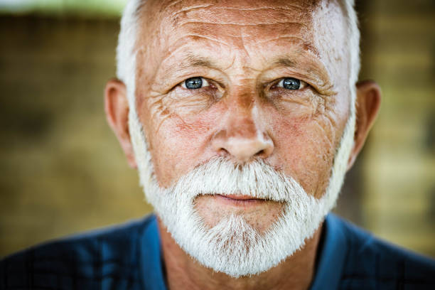 Portrait of a senior man. Portrait of mature man with blue eyes looking at camera. blue eyes stock pictures, royalty-free photos & images