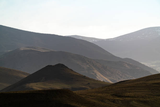 istock Mountain ridge terrain in haze landscape 1210043251