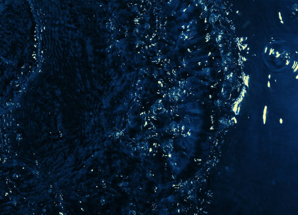istock texture of water on black background, Water in night time 1210043438